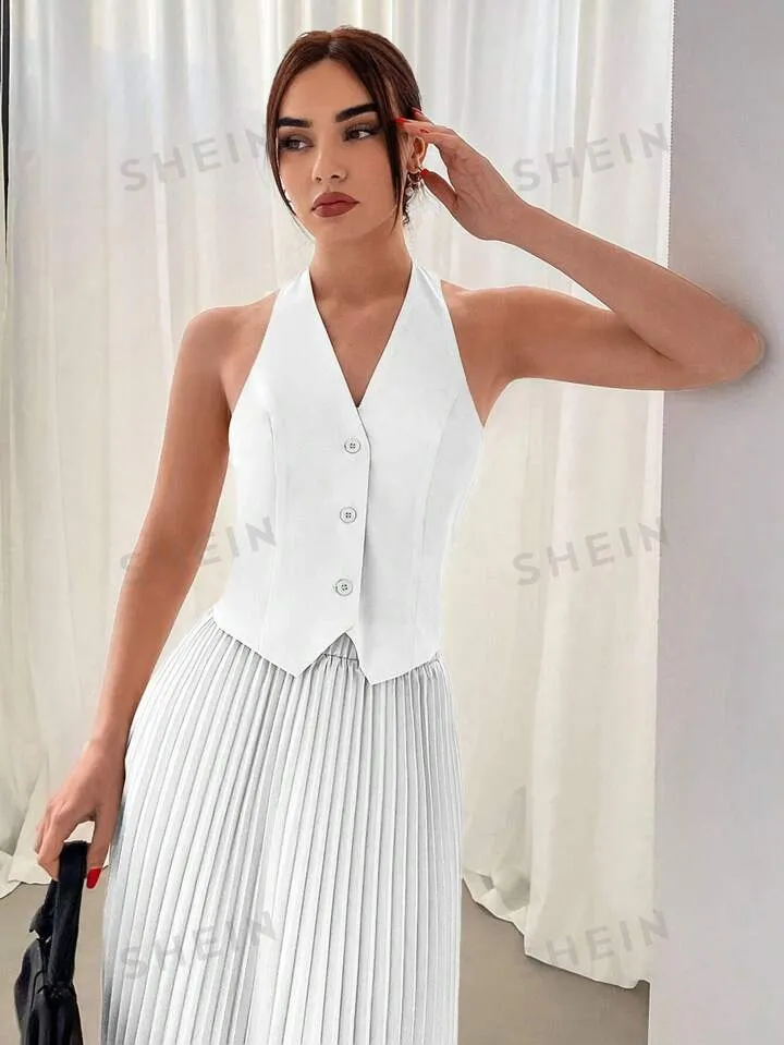 Halterneck vest and pleated skirt set in white