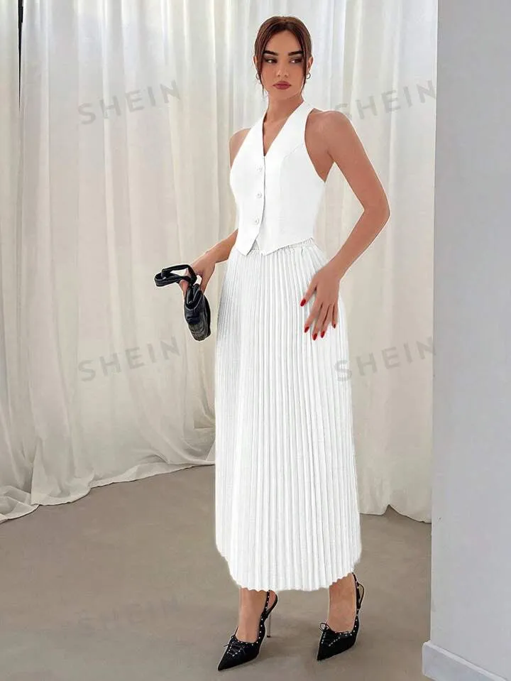 Halterneck vest and pleated skirt set in white