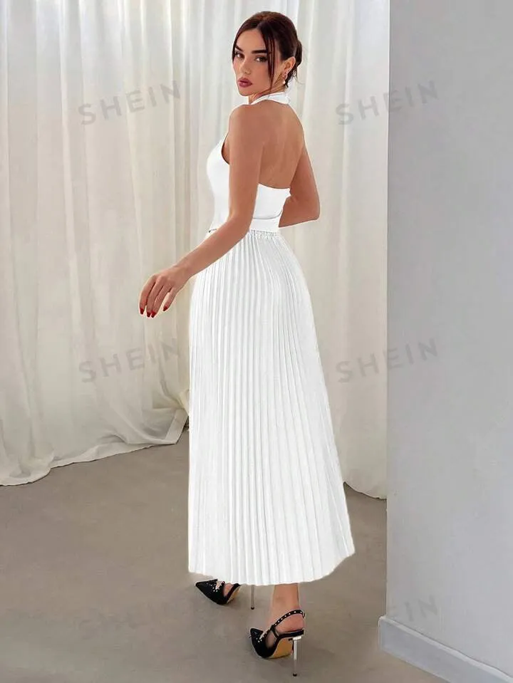 Halterneck vest and pleated skirt set in white