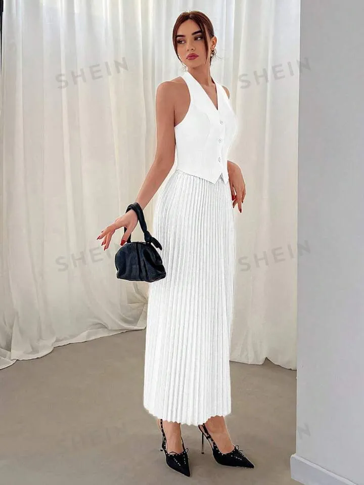 Halterneck vest and pleated skirt set in white